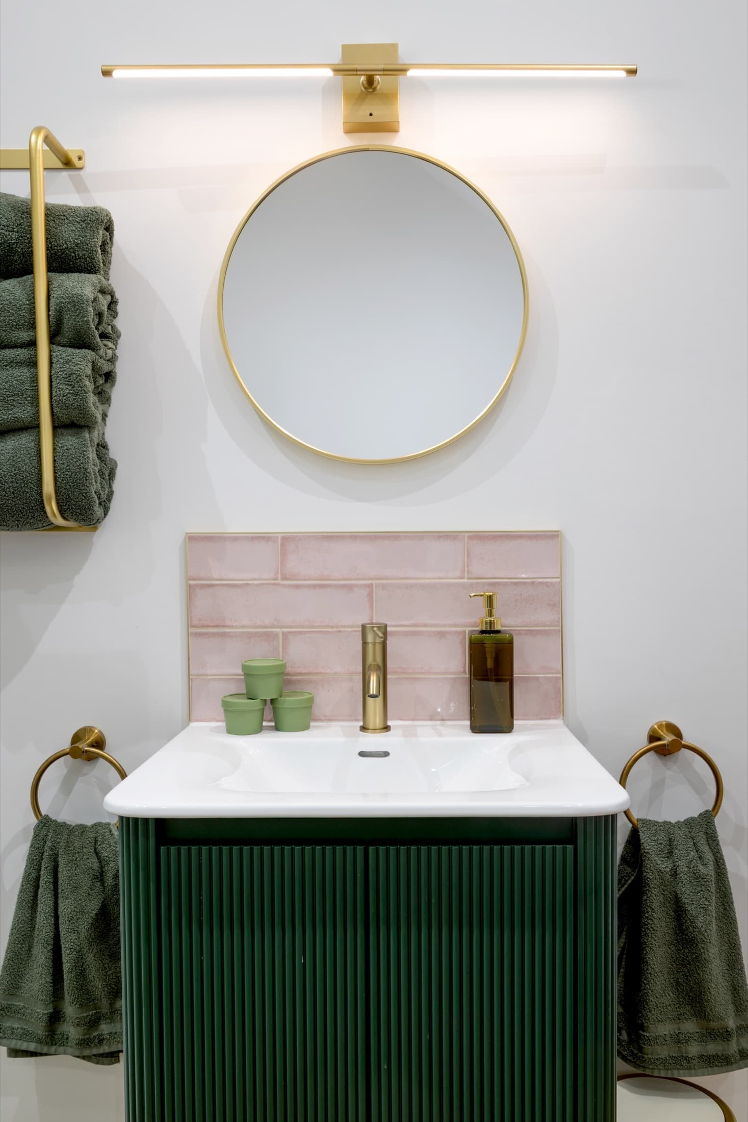 Guest bathroom with gold fixtures